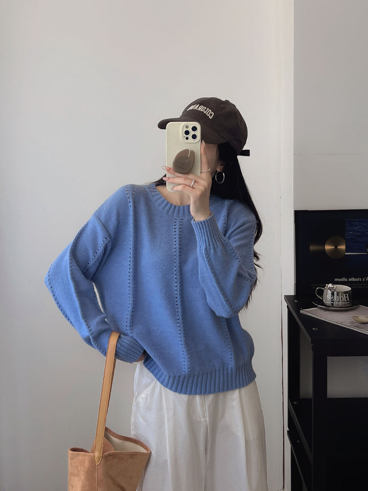 Pull en maille épaisse pour femmes avec une silhouette féminine et un design texturé Chic & Stil