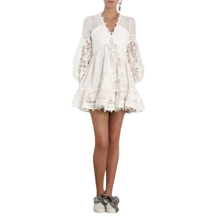 Women's playful floral dress with ruffle details and sheer puff sleeves Lune London