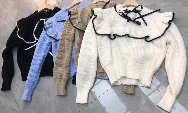 Knitted sweater for women with ruffled collar and decorative bows Lune London