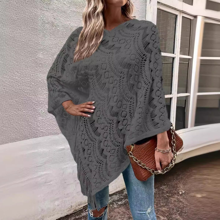 Knit poncho for women with an eye-catching crochet pattern and fashionable fringes Lune London