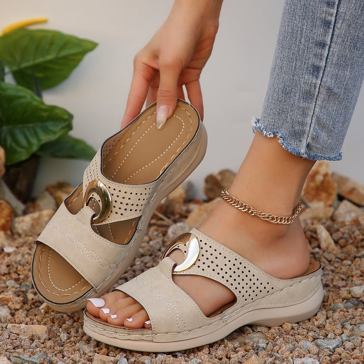 Women Sabot with perforations and decorative buckle Lune London