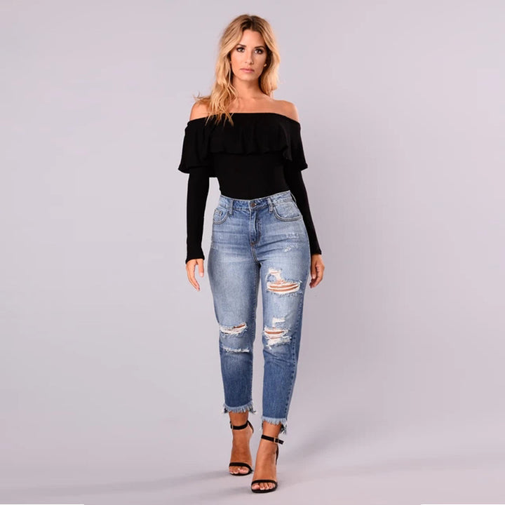 High-waisted jeans for women with a modern destroyed look featuring a trendy frayed hem Lune London