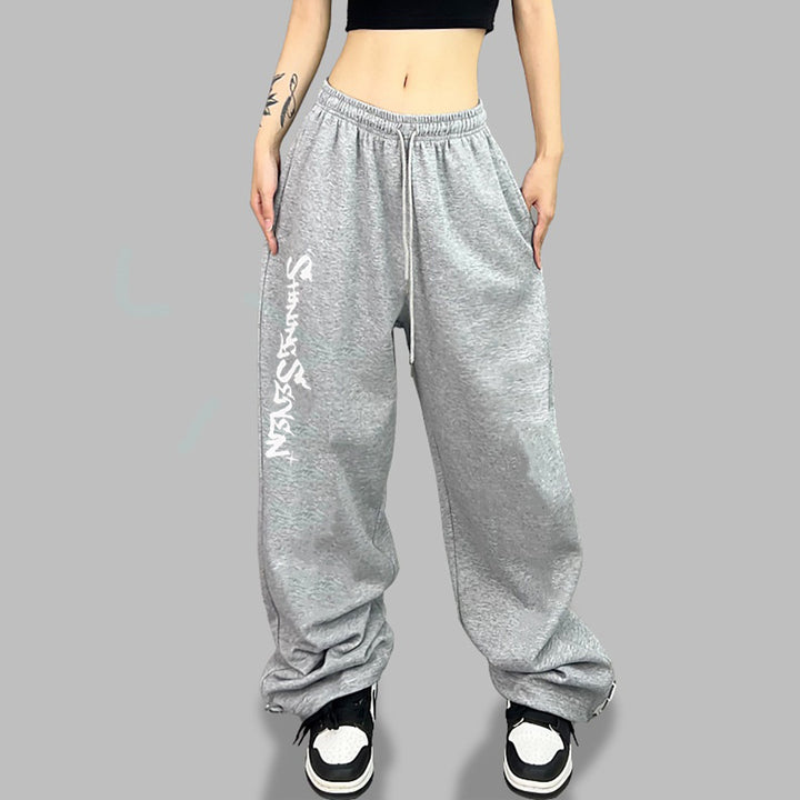 Women's casual jogging pants with a wide cut and sport graphic Chic & Stil