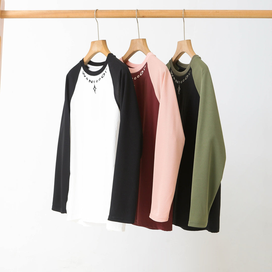 Chemise longue à manches longues sportive pour femmes avec construction innovante de manches raglan Chic & Stil