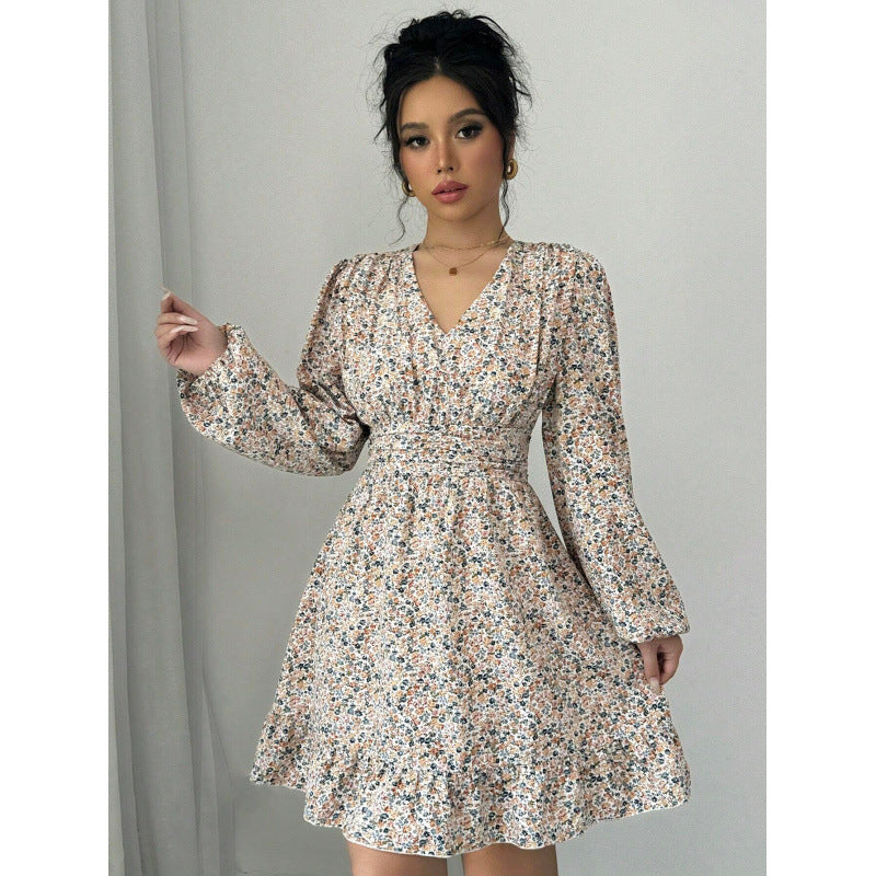 Mini dress adorned with flowers for women with deep V-neck and voluminous sleeves Lune London