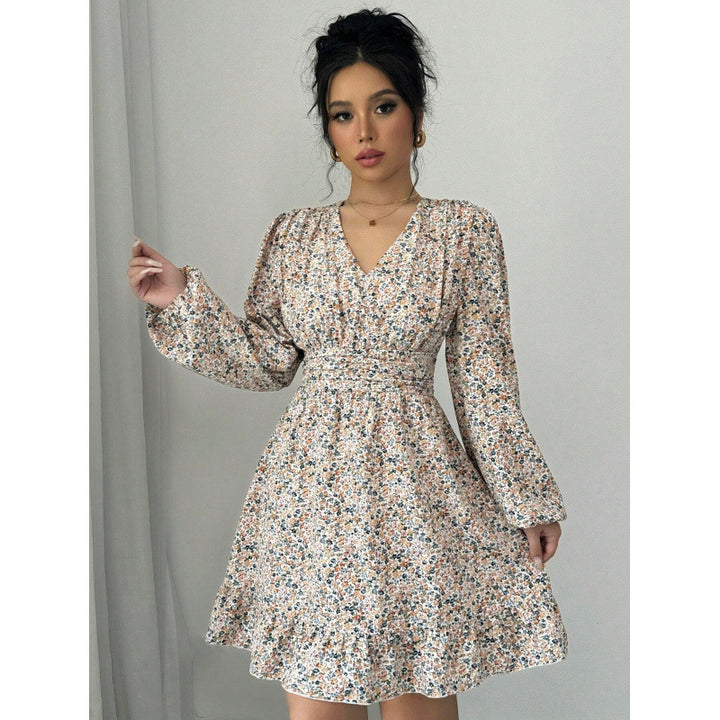 Mini dress adorned with flowers for women with deep V-neck and voluminous sleeves Lune London