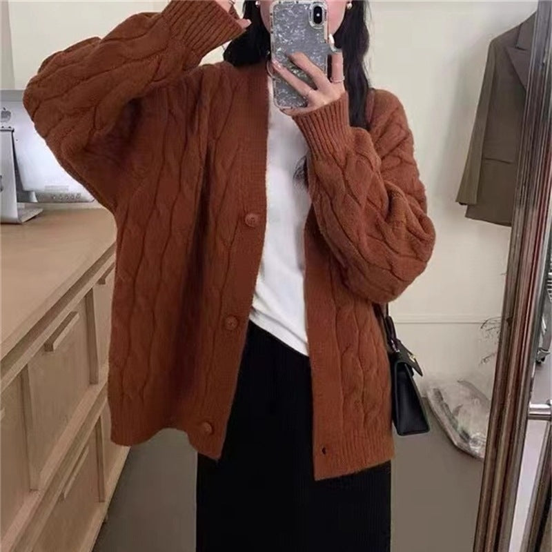 Thick knitted cardigan for women with classic cable patterns and a relaxed fit Lune London