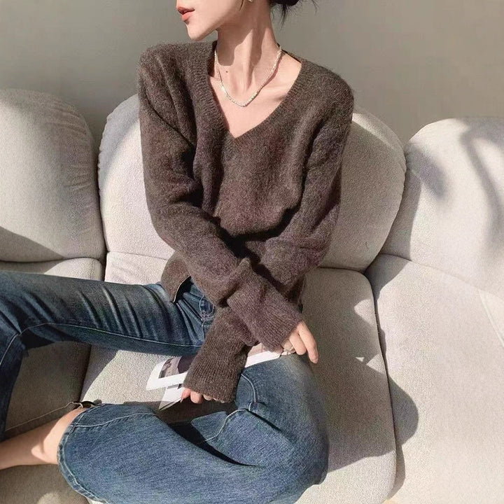 Cardigan féminin à la mode avec un décolleté en V profond et fermeture éclair Chic & Stil