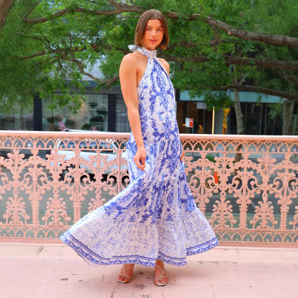 Women's maxi dress in elegant bohemian style with seductive neckline and flowing cut