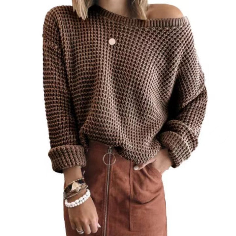 Oversized casual style knitted sweater for women with an off-shoulder design.