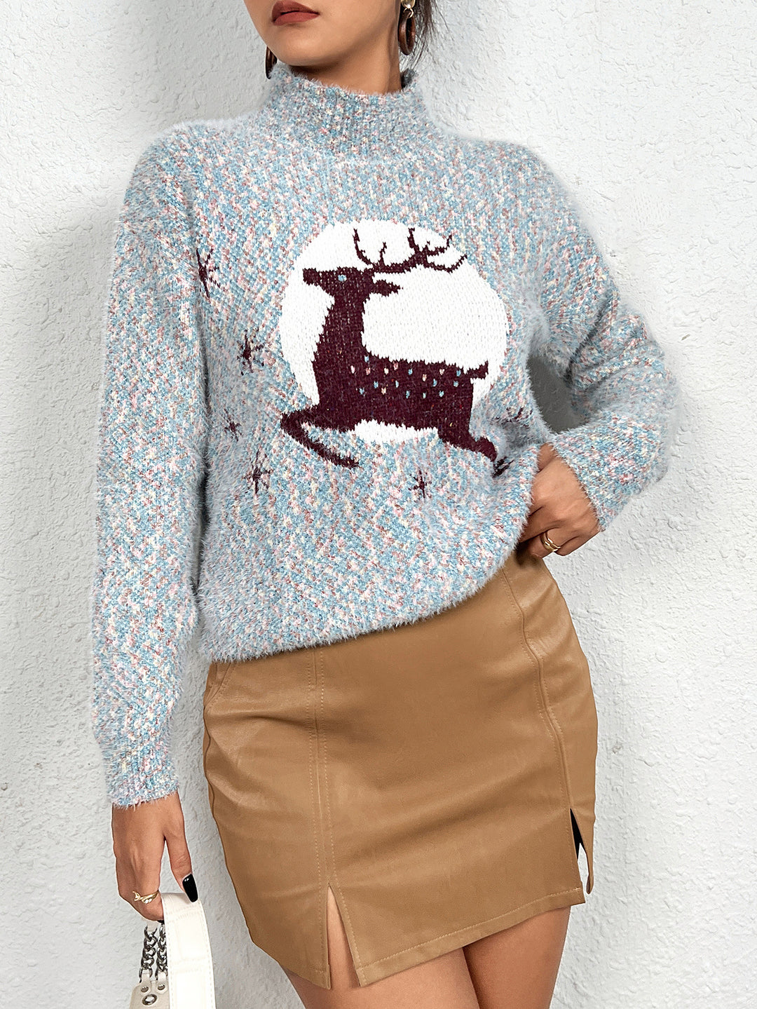 Knitted women's sweater with festive reindeer pattern and high collar Lune London