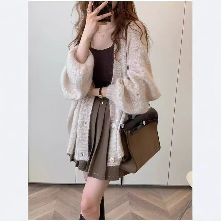 Oversized casual knit jacket for women with voluminous sleeves and practical pockets Lune London