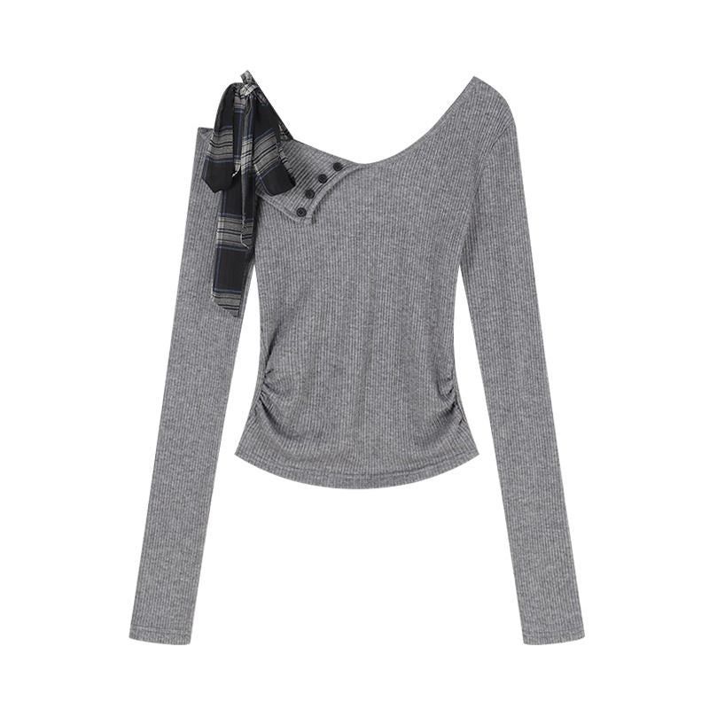 Women’s long sleeve top with modern asymmetric neckline and decorative button details Chic & Stil