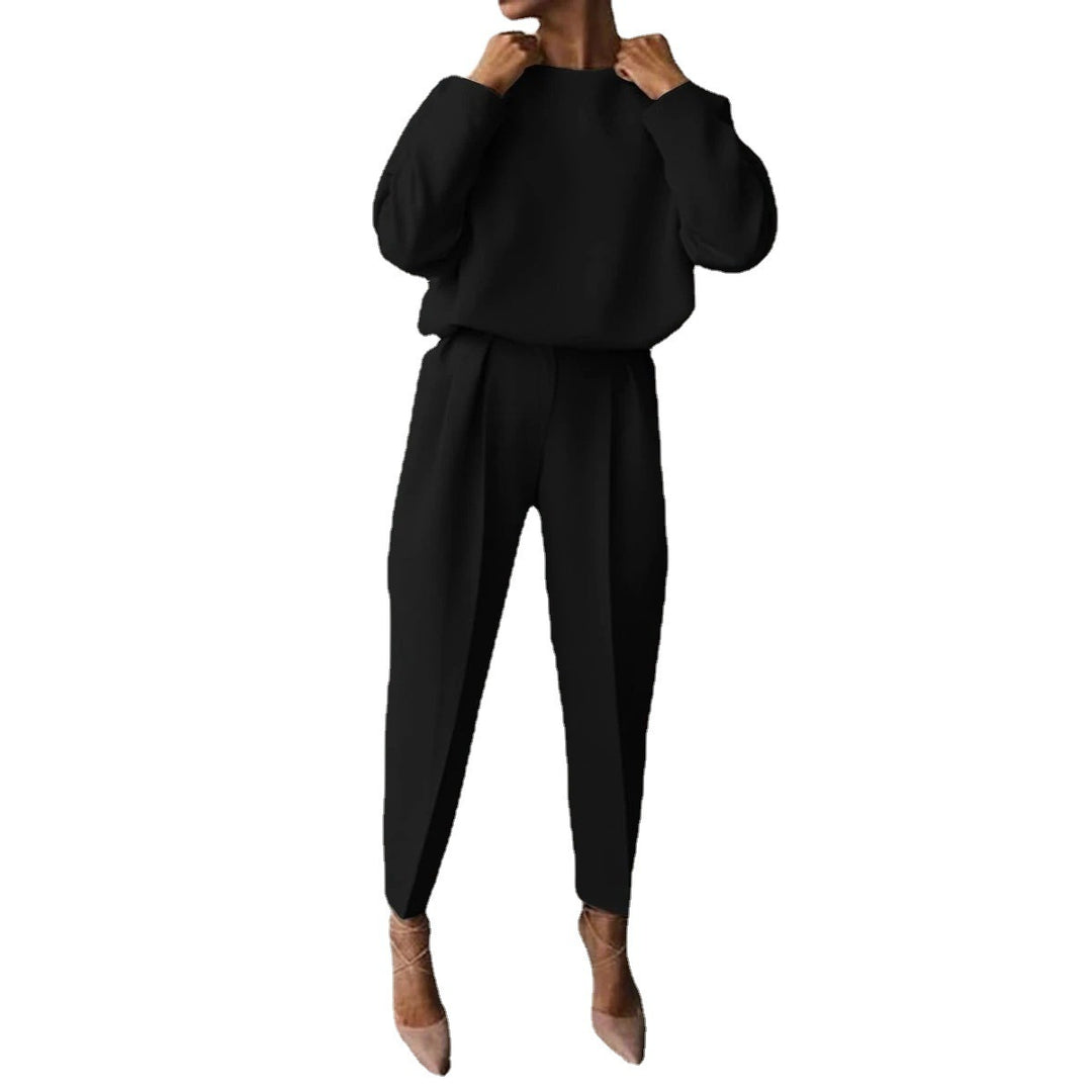 Trendy women's jumpsuit with loose fit and elegant puffed sleeves Lune London
