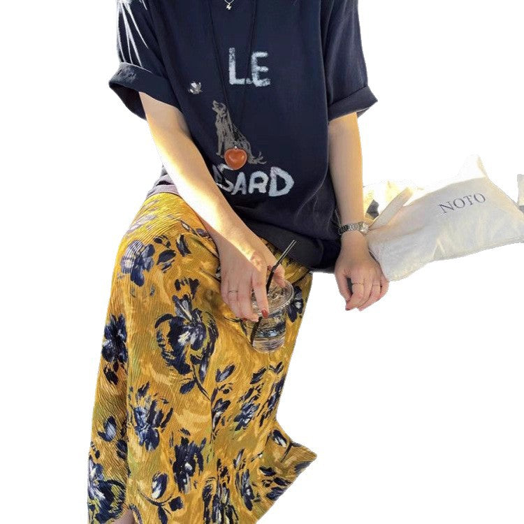Maxi skirt for women with elegant pleats and floral appliqués Lune London