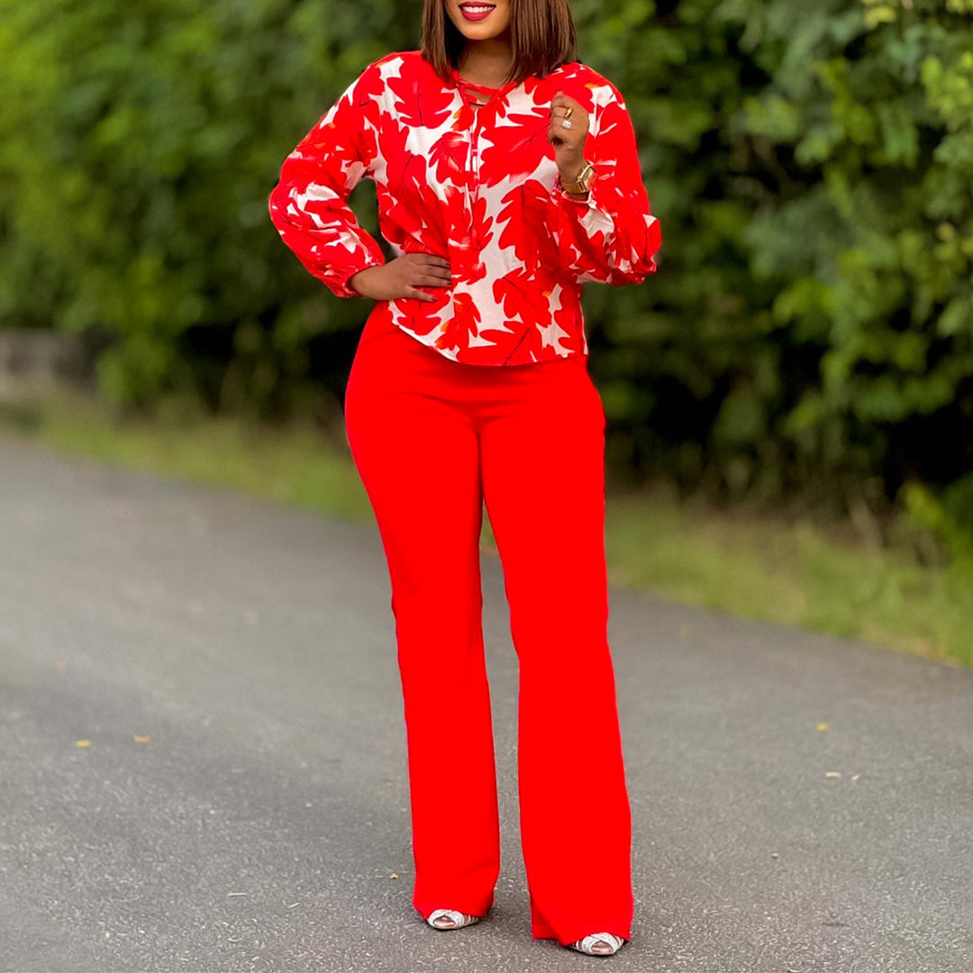 Women Elegant set consisting of a casual blouse with voluminous sleeves and classic pants Lune London