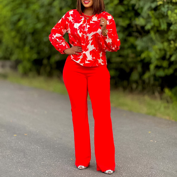 Women Elegant set consisting of a casual blouse with voluminous sleeves and classic pants Lune London