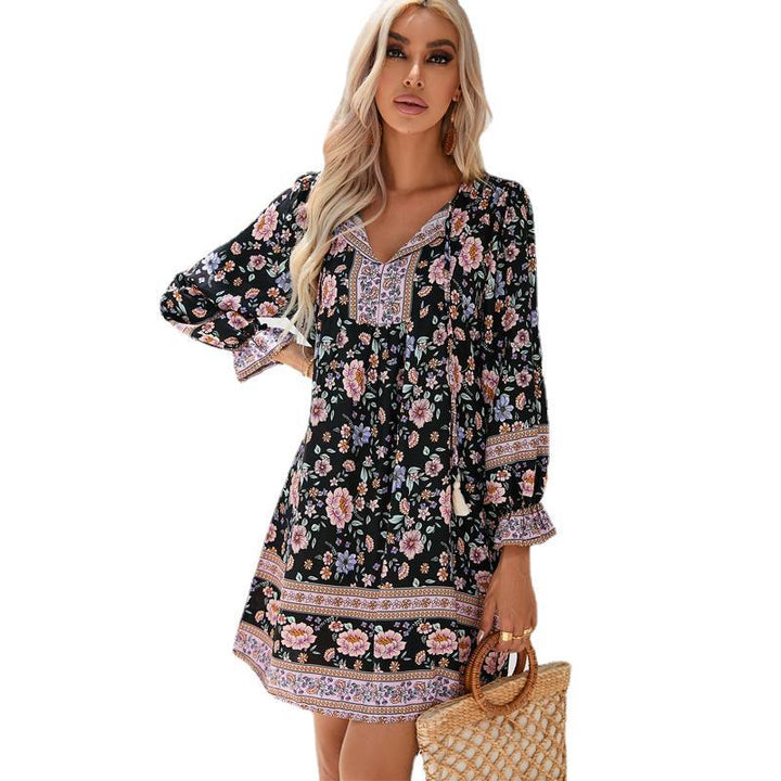 Ladies playful floral dress with flounced sleeves and V-neck Lune London