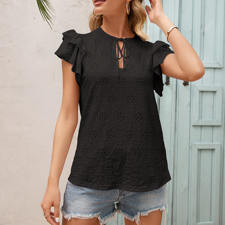 Women's blouse with ruffle details and a perforated pattern Lune London