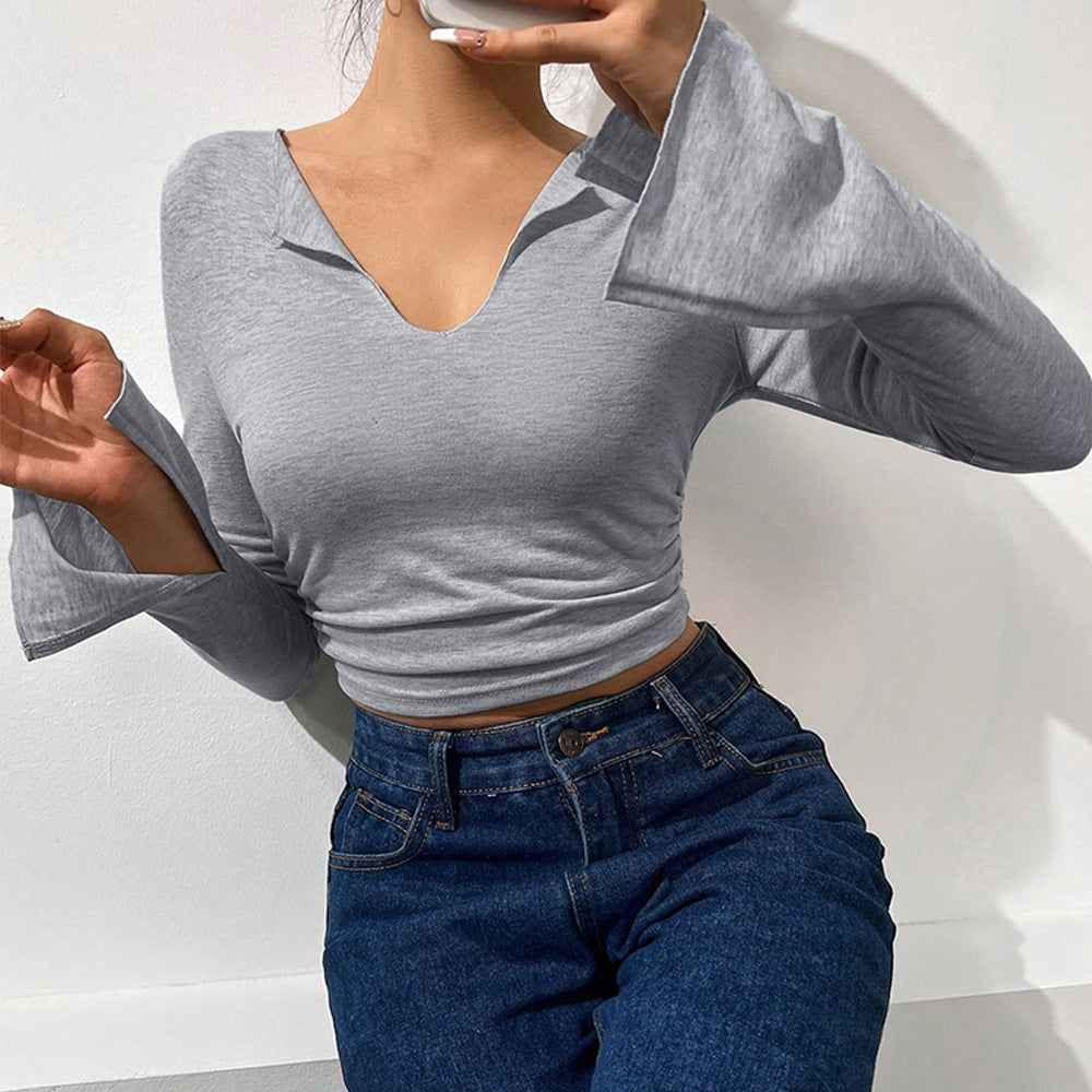 Short women's shirt with trendy bell sleeves and an elegant V neck Chic & Stil
