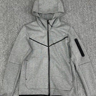 Sporty fleece jacket for men with adjustable hood and functional zip pockets Lune London