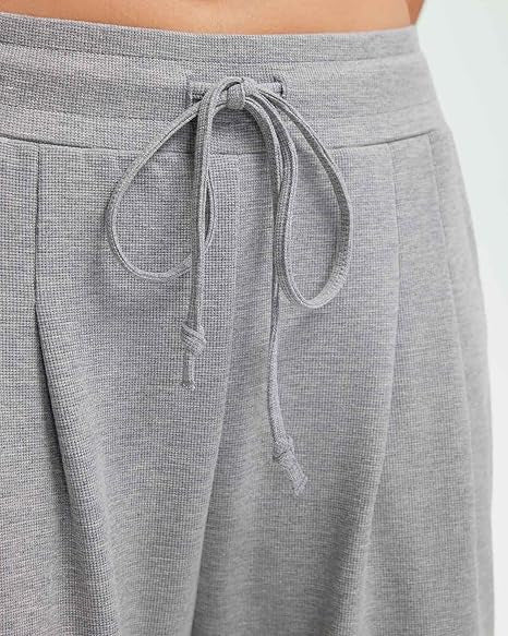 Pantalons décontractés amples pour femmes avec détails en bouton Chic & Stil