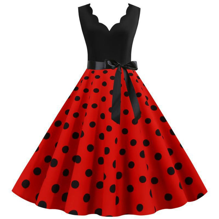 Robe swing femme avec un design moderne à pois et un élégant col en V Chic & Stil