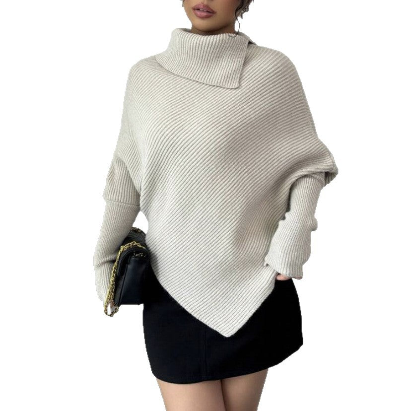 Women oversized knitted sweater with high collar and asymmetrical shape Lune London
