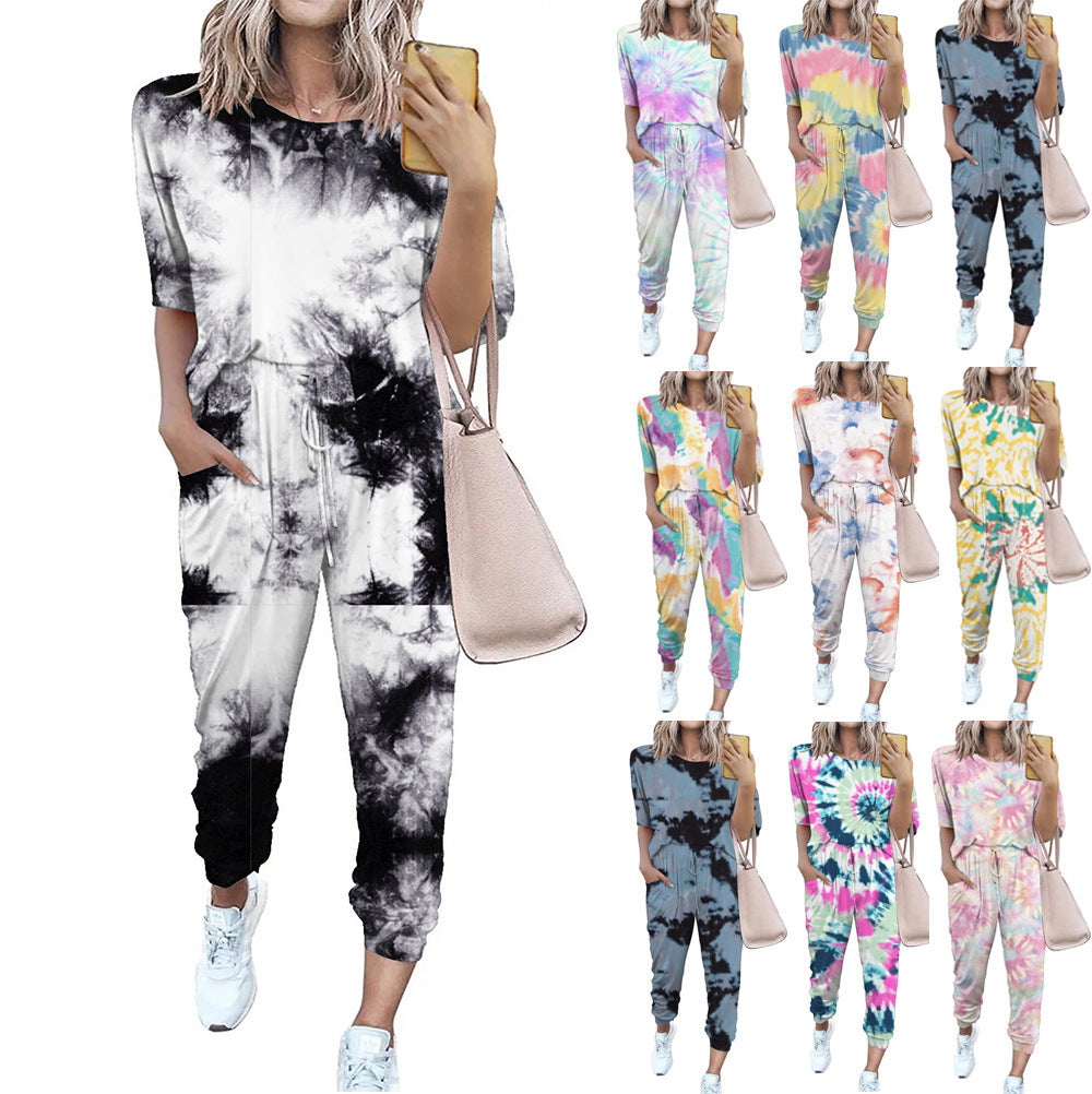 Ladies lightweight casual jumpsuit with a striking tie-dye pattern and practical pockets Lune London