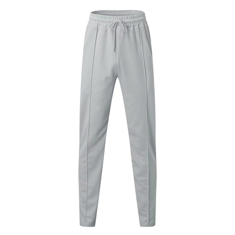 Sports jogger pants for men with elastic waistband and zip pockets Lune London