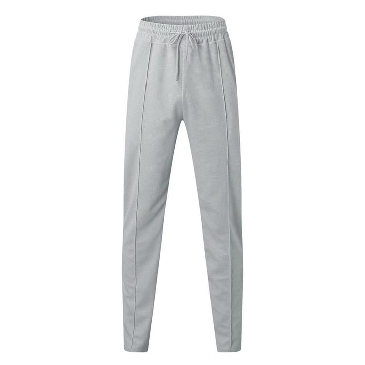 Sports jogger pants for men with elastic waistband and zip pockets Lune London