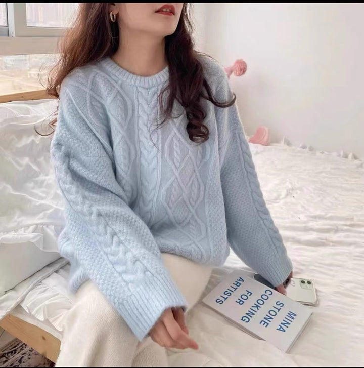 Oversized knitted sweater for women with cable knit pattern Lune London