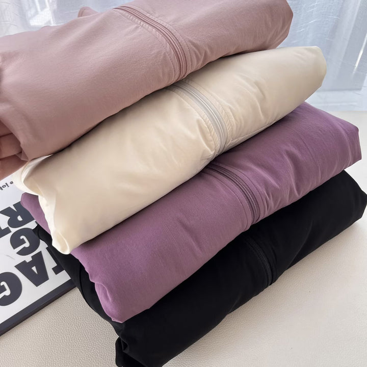 Veste en polaire confortable pour femmes avec col haut et poches pratiques Chic & Stil