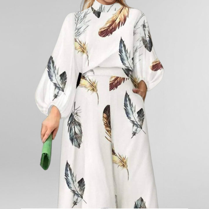 Ensemble élégant pour femme en deux pièces avec des manches en forme de ballon et un design en plumes Chic & Stil
