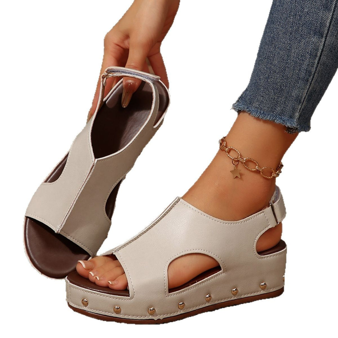 Wedge heeled sandals for women with modern cutouts and sparkling studs Lune London