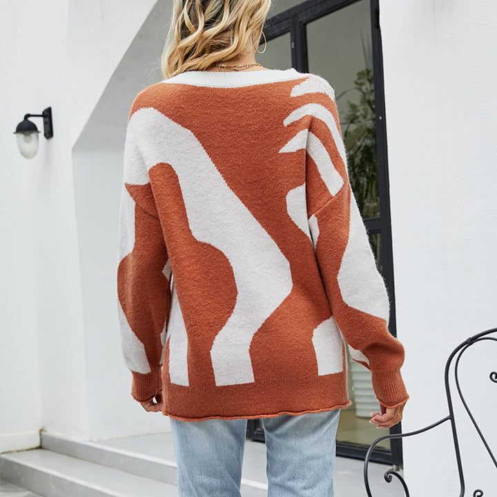 Ladies oversized cozy sweater with button details and creative pattern Lune London