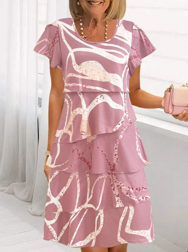 Fluid wrap dress for women with an elegant overlay and a unique pattern Lune London