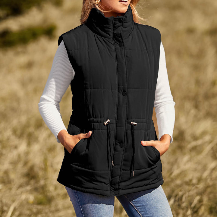 Ladies sleeveless down jacket with high collar and practical zippered pockets Lune Londonl