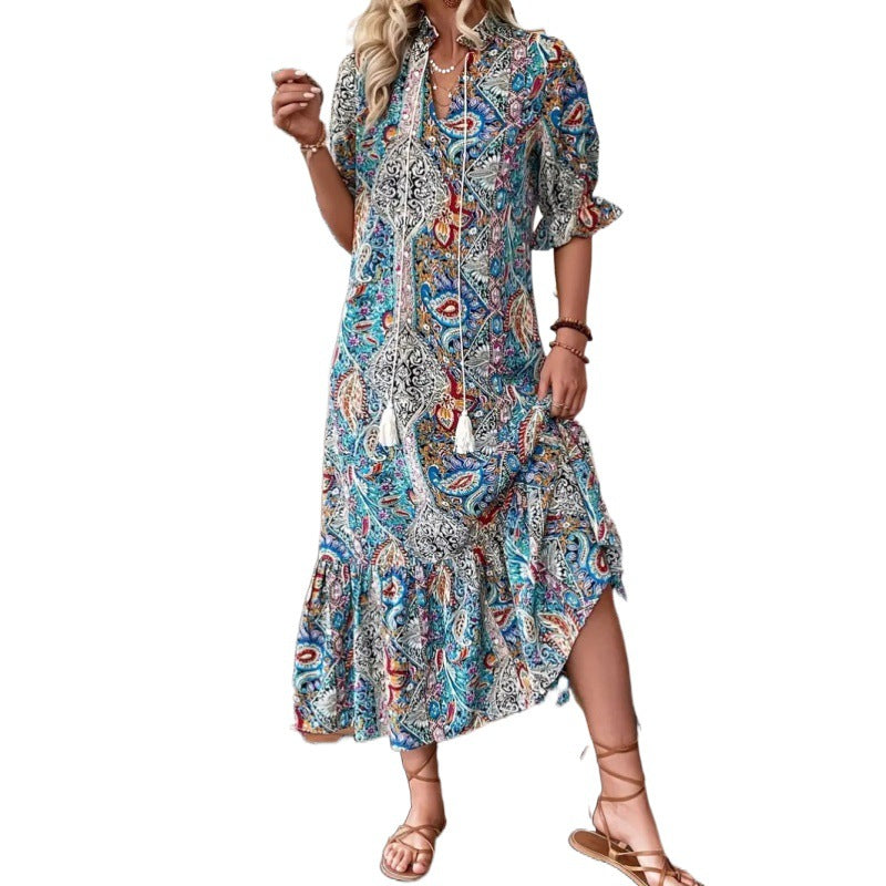 Maxi dress for women with playful paisley pattern and ruffled details Lune London