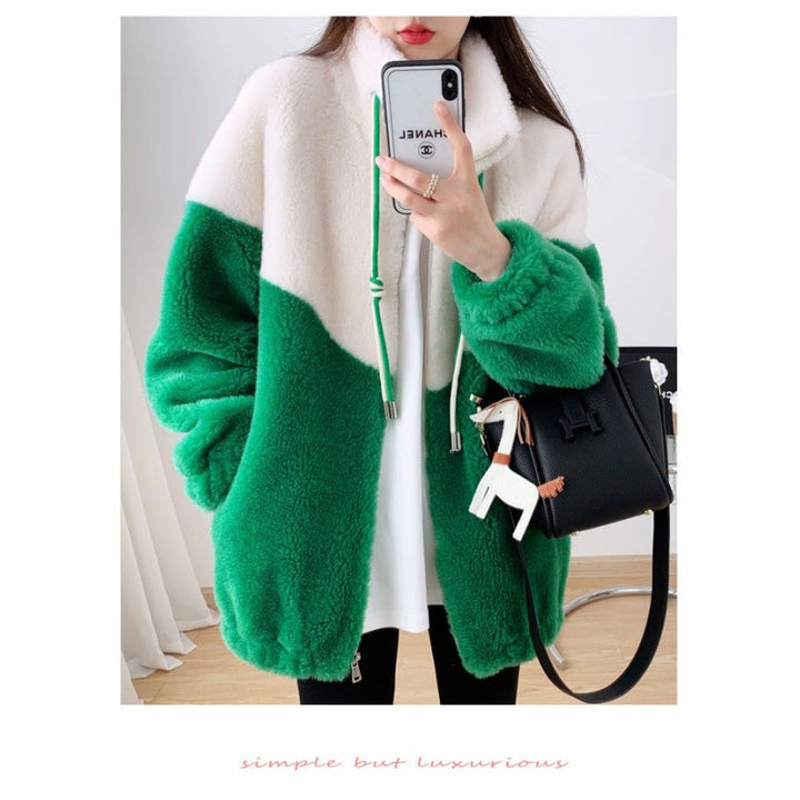 Women’s plush jacket with high closing collar and practical zippered pockets Chic & Stil