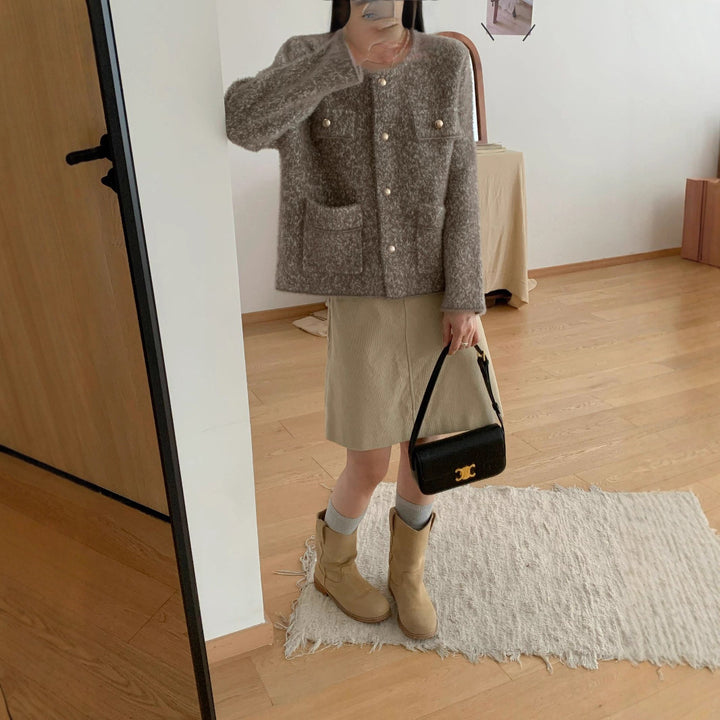Veste en tricot confortable pour femmes avec détails en bouton et poches plaquées Chic & Stil