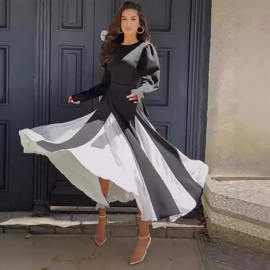 Elegant long dresses for women with puff sleeves and a flowing hem Lune London