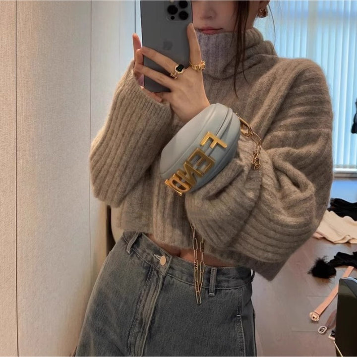 Pull pour femmes à col roulé tendance avec structure côtelée et coupe décontractée Chic & Stil