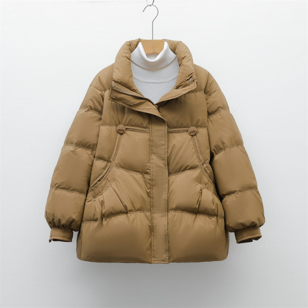Bulky winter jacket for women with practical pockets and high collar Lune London