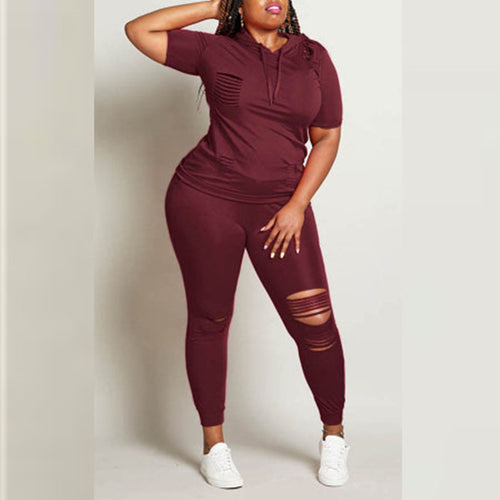 Women's jogging suit with stylish zip details and a chic sporty fit