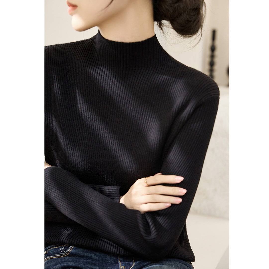 Pull à col roulé tendance pour femmes avec design en côtes texturées et manches contrastantes Chic & Stil
