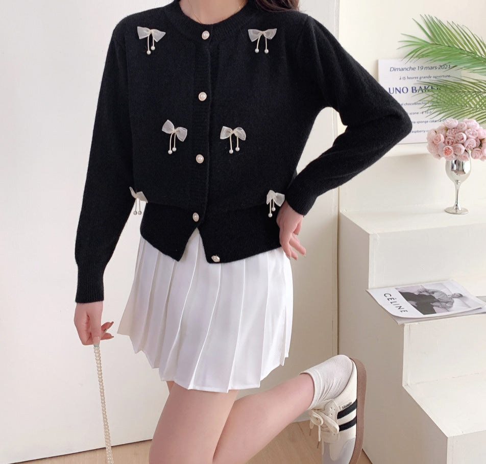 Knitted jacket for women with lace embellishments and button details Lune London