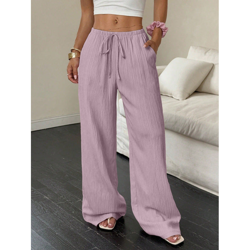 Casual and wide trousers for women with elastic waist and tie belt Lune London