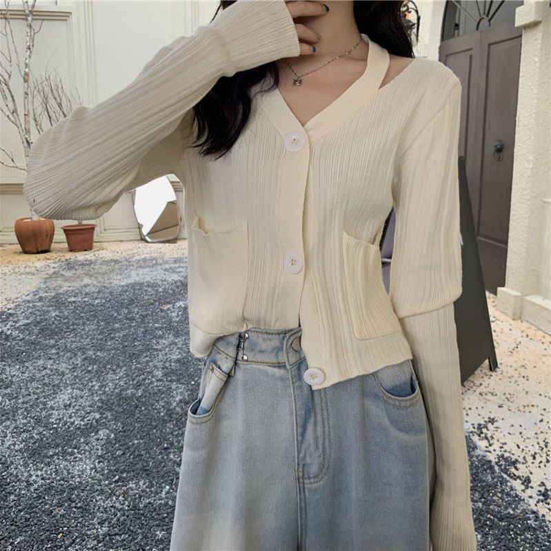 Cardigan élégant pour femmes avec col en V et poches Chic & Stil