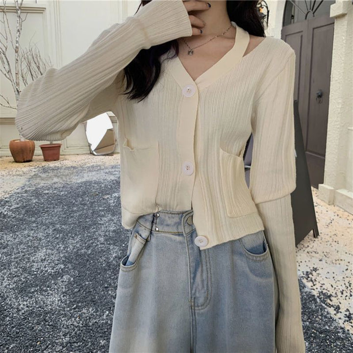 Cardigan élégant pour femmes avec col en V et poches Chic & Stil